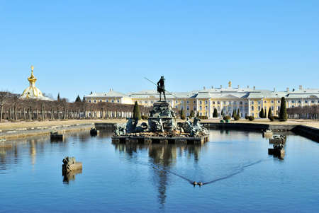 Peterhof. The Palace and the Fountain Neptune in  springの写真素材