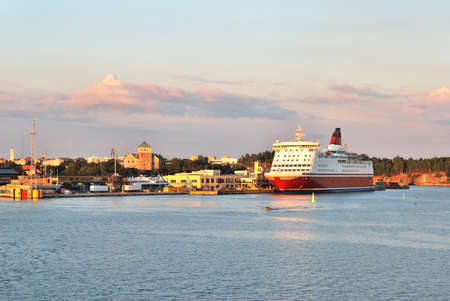 Turku sea-port at sunset with the Castle on the background. Finlandの写真素材