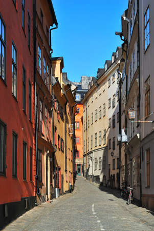 Stockholm. Narrow street of the Old Town lightened  by the morning sunの写真素材