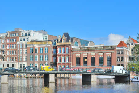 Amsterdam. Old buildings on the River Amstel  Embankment  のeditorial素材