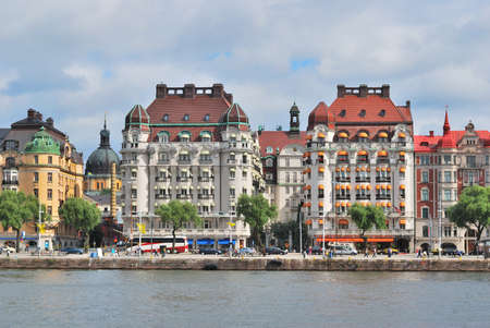 Stockholm . Beautiful buildings on the quay  against the cloudy skyの写真素材