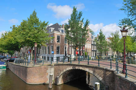 Amsterdam. The bridge at the intersection of  Keizersgracht and Regulirsgraht canalsの写真素材