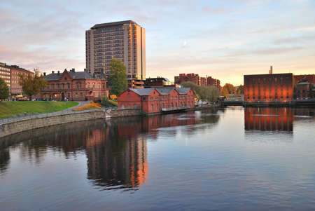 Tampere, Finland. Tammerkoski river quay at sunset の写真素材