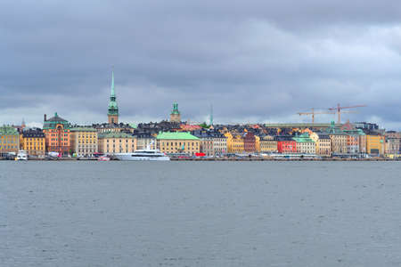 Stockholm, Sweden. View of the Old Town from the sea in a cloudy summer dayの写真素材