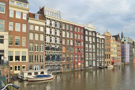 Netherlands. Beautiful buildings in the Old town of Amsterdamの写真素材