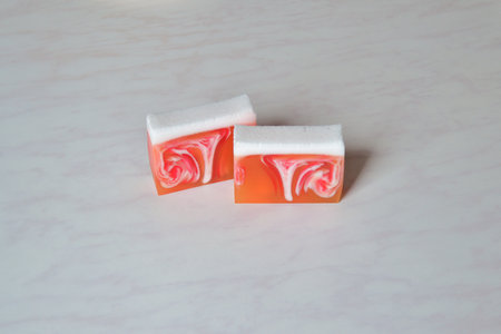 Original handmade soap with beautiful red and orange patternsの写真素材