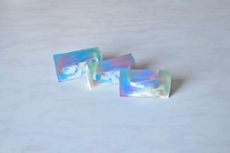 Three pieces of beautiful original handmade soap with patternsの写真素材