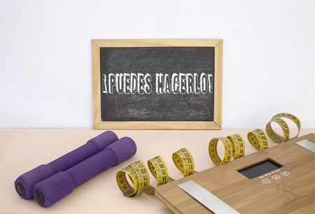 You can do it message on blackboard next to a scale, diet and tape metricaの写真素材