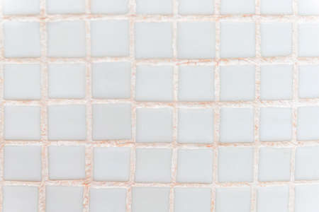 Photography of the wall with Mosaic tile in squares pattern, white colorの写真素材