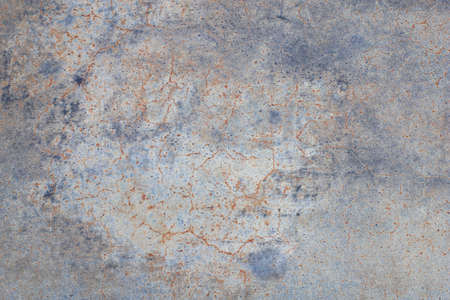 Photography of metal surface texture with rust and abstract. Iron surface, metal with scratches. Blue and gold color. Grunge Style.の写真素材