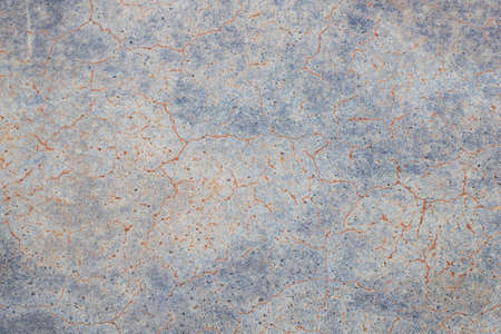 Photography of metal surface texture with rust and abstract. Iron surface, metal with scratches. Blue and gold color. Grunge Style.の写真素材