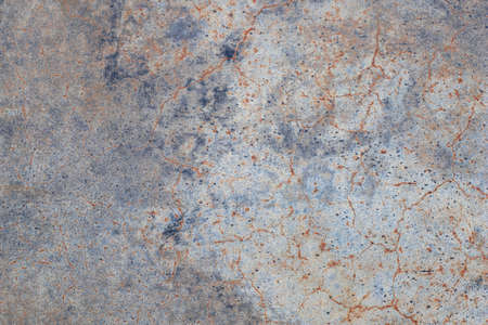 Photography of metal surface texture with rust and abstract. Iron surface, metal with scratches. Blue and gold color. Grunge Style.の写真素材