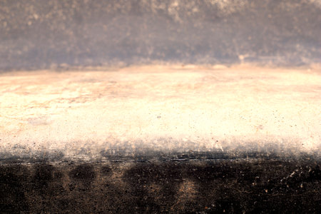 Photography of metal surface texture with rust and abstract. Iron surface, metal with scratches. Golden, bronze, brown color. Grunge style.の写真素材