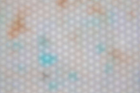 Photography of a metallic surface in the shape of a geometric grid. metal rusty surface with blur...