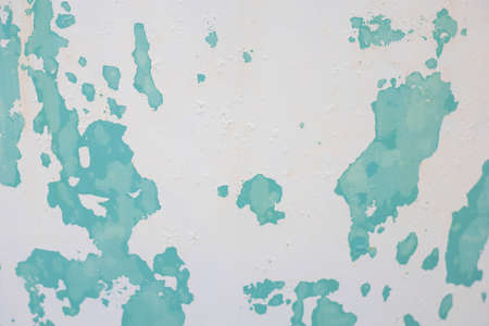 Photograph of a painted surface with a paint stain. Texture and wallpaper. painted wall, painted wallの写真素材