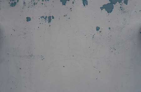 Photograph of a painted surface with a paint stain. Texture and wallpaper. painted wall, painted wallの写真素材