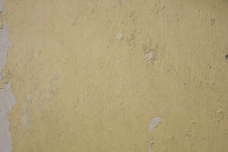 Photograph of a painted surface with a paint stain. Texture and wallpaper. painted wall, painted wallの写真素材