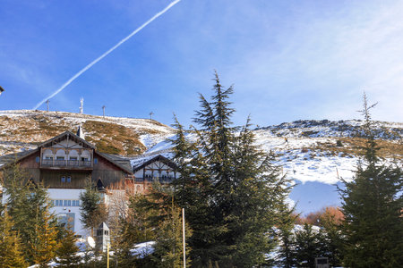 House of beautiful houses in snowy mountain in Sierra Nevada, Granada, Spain, Europe during a winter dayの写真素材