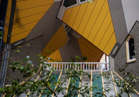 Photograph of the Kubuswoning, the cube houses in Rotterdam, The Netherlands. Yellow color and original architecture.の写真素材