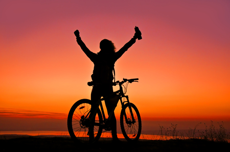 Young lady with bicycleの写真素材