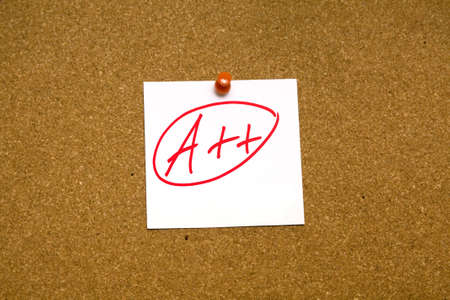 a++ sticky note on cardboardの写真素材