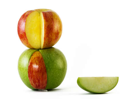 red and green apples standing one on another