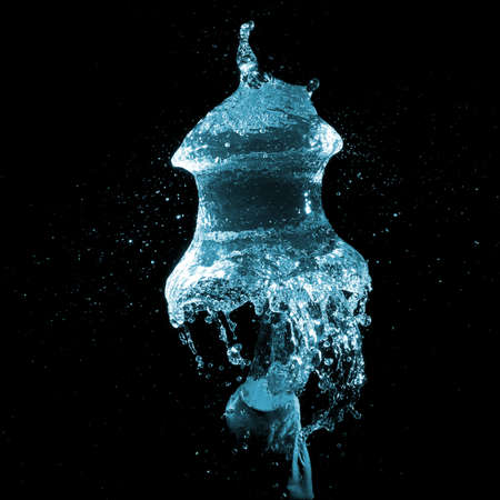 blue water balloon explosion shaped like medusaの写真素材