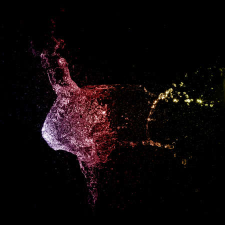 gradient painted water balloon bomb splashの写真素材
