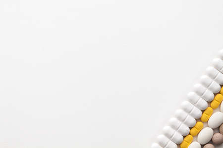 Empty white background with tablets. Place for text.の写真素材