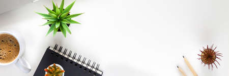 Office desk. Coffee and office supplies. Copy space. Panorama