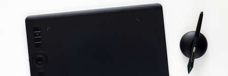 Graphic tablet on a white empty background. Computer graphics desk. Panoramaの写真素材