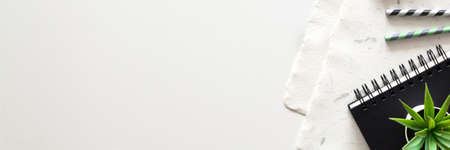 Copy space with handmade paper and sketchbook. Panorama.の写真素材