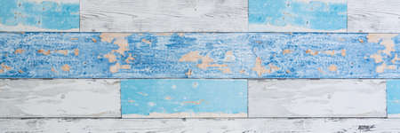 A desk by a wall made of old boards. Copy space. Scandinavian style. Panorama.の写真素材