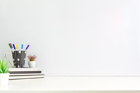 An office by an empty wall. Home Office. School desk. Copy space.の写真素材