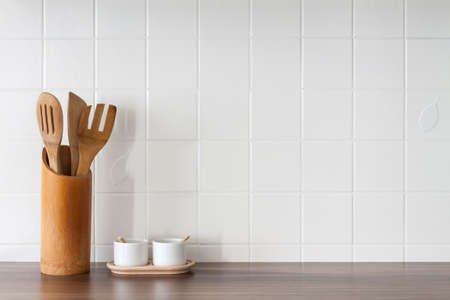 Kitchen with white tiles on the wall. Kitchen tools. Copy space.の写真素材