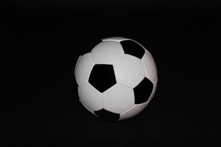 soccer ball on black の写真素材