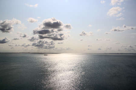 Sea in Zeeland on a day with clouds and sun