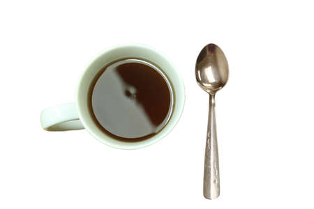 Apple cider and a spoon on a white backgroundの写真素材