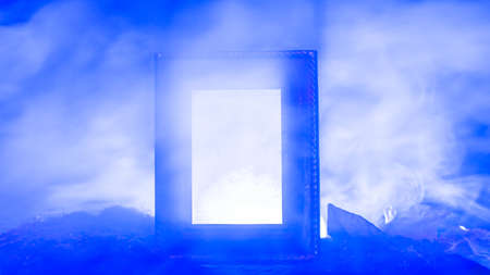 Image of a backlit frame which is partly obscured by smoke symbolizing a doorway to another...