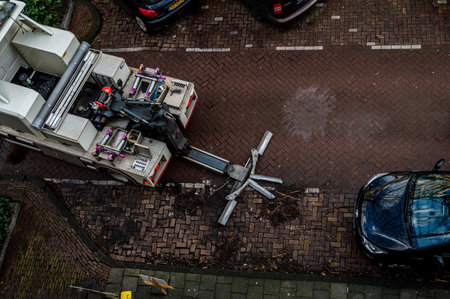 Amsterdam, The Netherlands February 25, 2022. A Tow truck getting ready to remove a car in Amsterdam, The Netherlandsのeditorial素材