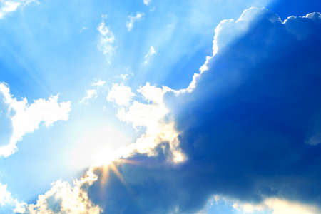 Shining sun at clear blue skyの写真素材