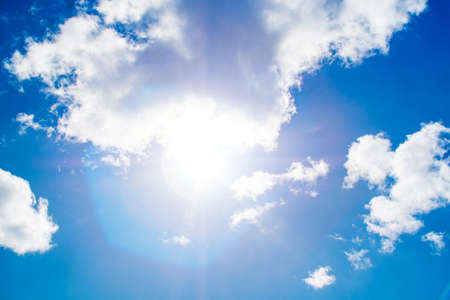 Shining sun at clear blue skyの写真素材