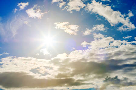 Shining sun at clear blue skyの写真素材