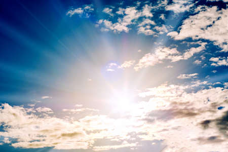 Shining sun at clear blue skyの写真素材