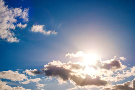 Shining sun at clear blue skyの写真素材