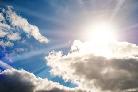 Shining sun at clear blue skyの写真素材