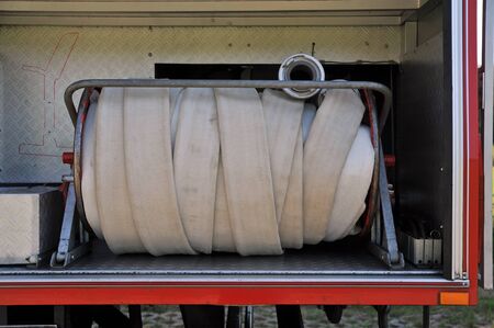 fire hose in a german fire truckの写真素材