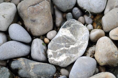 Textured pebbles on a beachの写真素材