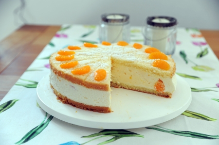 Torte with cream, curd and manderinesの写真素材