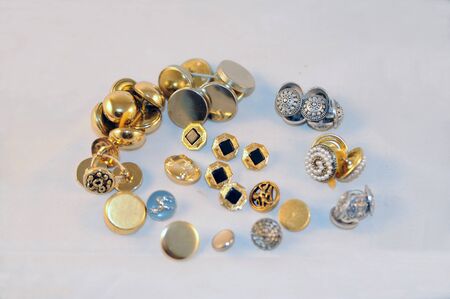 group of different metal buttonsの写真素材